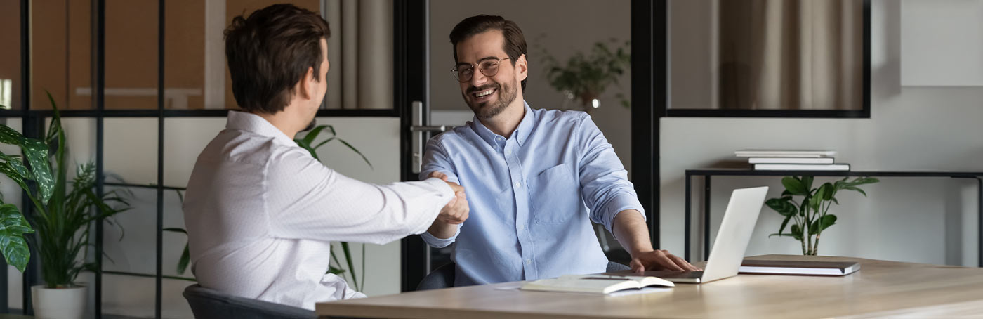 2 men shaking hands
